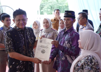 Pemkab OKU Timur Serahkan 300 Sertifikat TORA, Dorong Kepastian Hukum dan Ekonomi Masyarakat